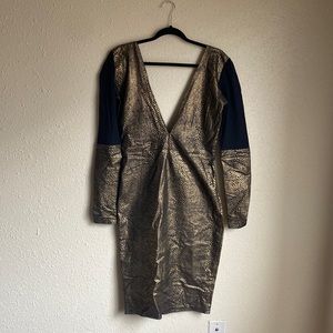 Gold and black hand sewn dress.